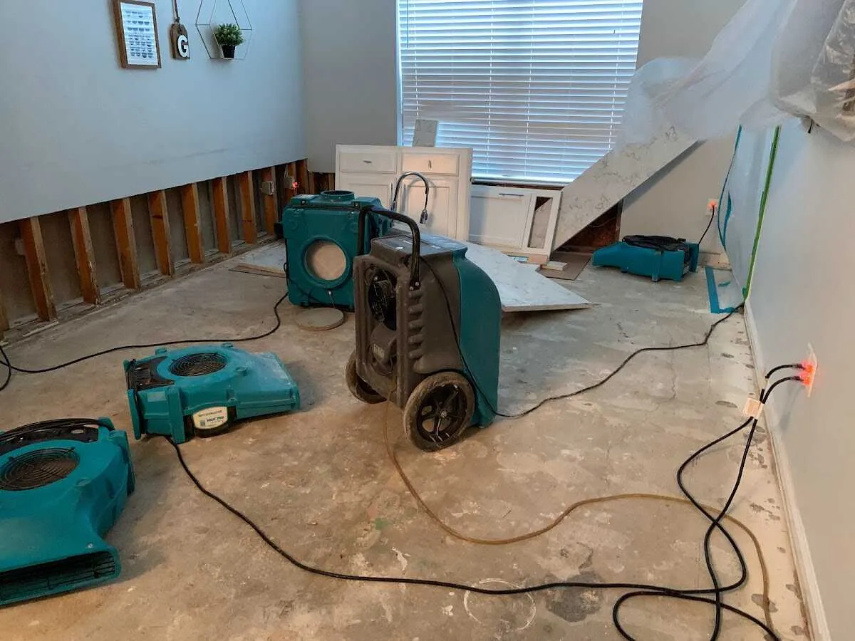 Dehumidifier in flood-cut room for Water Damage Restoration in Los Alamitos